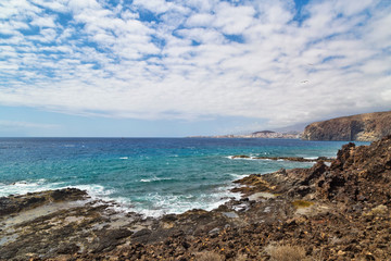 stonesl beach under blue sky