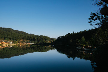 The Reflection of home town in the River, Riverside view at Rak Thai Village, Mae hong son, Thailand