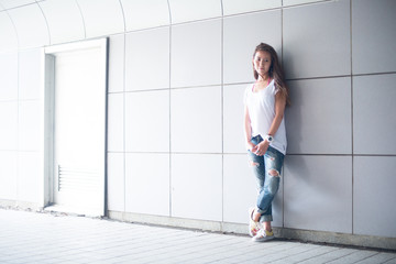 Asian female model poses for pictures on the street