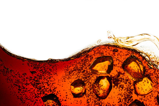 cola soda with sparkling bubbles isolated on white