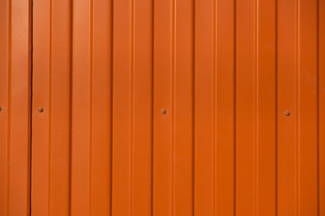 Corrugated metal orange fence