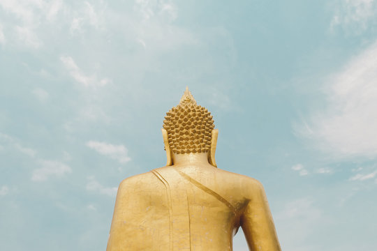 Big gold buddha with statue - the symbol of buddhism at the Pattaya, Thailand