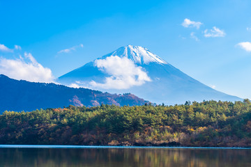 Beautiful landscape of mountain fuji with maple leaf tree around lake