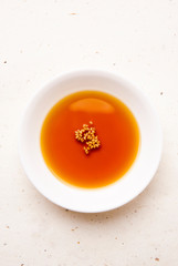 Sesame oil on a plate.