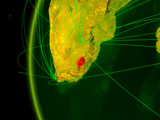 Lesotho from space on digital model of Earth with international networks. Concept of digital communication or travel.