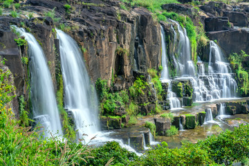 Mystical waterfall in the Da Lat plateau, Vietnam. This is known as the first Southeast Asian waterfall in the wild beauty attracted many tourists to visit