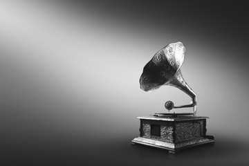 Old gramophone on a gray background / high contrast image
