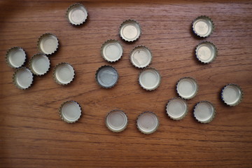 the bottle cap is scattered above the tray