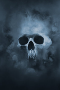 high contrast image of a skull in a smoke cloud