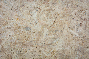 OSB plywood board texture, pressed wooden panel background