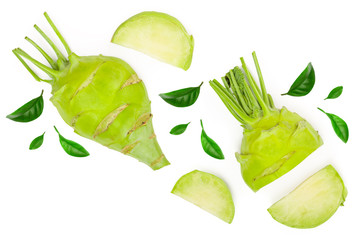 Fresh kohlrabi with green leaves isolated on white backround. Top view. Flat lay
