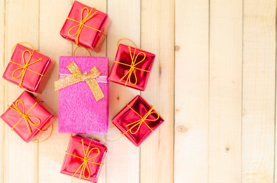 Blurry Gift Box on wood background,holiday and happy time.