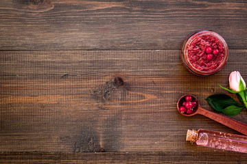 organic cosmetics for homemade spa with wineberry salt on wooden background top view mockup
