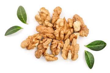 peelled Walnuts with leaves isolated on white background. Top view. Flat lay
