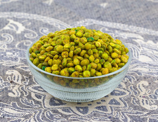 Indian Namkeen Snack Food Masala Green Peas Also Know as Spicy Green Peas, Masala Matar, Hara Matar, Masala Vatana, Spiced Fried Green Peas or Chatpata Matar Serve in Bowl