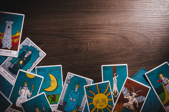 Tarot cards on a wooden background