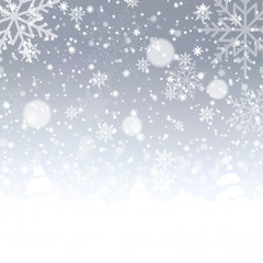 Blurred Christmas background with snowflakes and blue sky. Vector