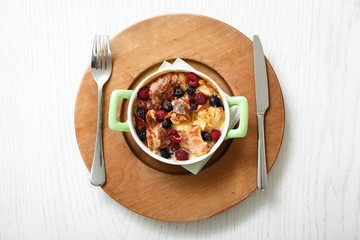 Top view casserole baked cherry and raspberries