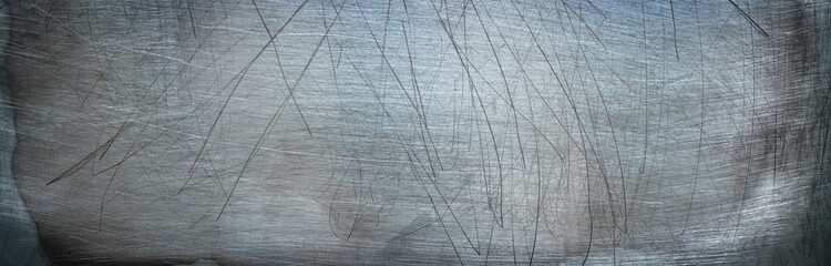 Dark texture of iron, brushed metal background. Panoramic view of steel surface