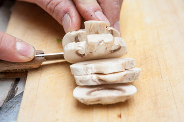 Cutting a mushroom