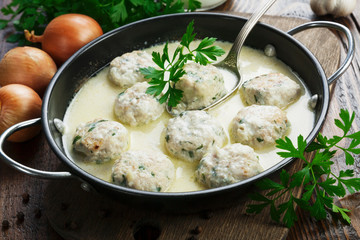 Chicken meatballs in milk sauce