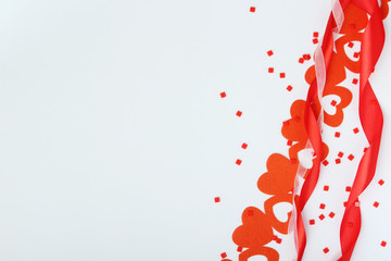 Background wit red ribbon and bright hearts for Valentine day decoration
