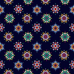 Vector sramless pattern with abstruct colorful snowflakes. Bright winter background.