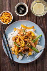 Kung Pao chicken, stir-fried Chinese sichuan traditional sichuan  dish with chicken, peanuts, vegetables and chili peppers.