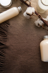 Natural spa cosmetics on a dark blue beton concrete background. Beauty blogger, minimalism concept, copy space