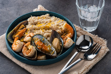Risotto with seafood. Rice with shrimps and mussels.