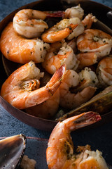 Cooked shrimp in a pan close-up.