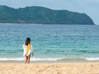 Fototapeta na wymiar People who take a holiday on the Nacpan beach at El nido, Palawan