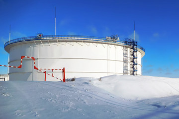 oil tank on refinery. winter industrial landscape