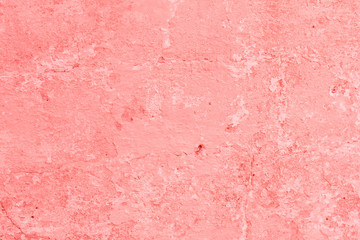 Fototapeta premium Texture, wall, concrete, living coral. It can be used as a background . Wall fragment with scratches and cracks