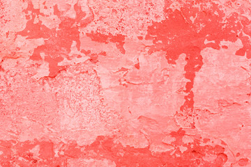 Texture, wall, concrete, living coral. It can be used as a background . Wall fragment with scratches and cracks