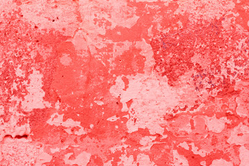 Texture, wall, concrete, living coral. It can be used as a background . Wall fragment with scratches and cracks