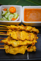 Pork satay, grilled pork served with sweet sour sauce.