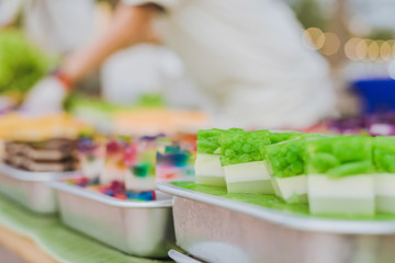 Colorful of Thai Jelly on aluminum tray for sale in street food.