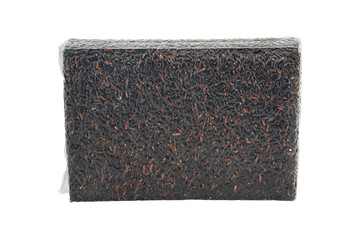 riceberry rice in plastic vacuum package on white background