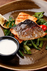 Grill Salmon Filet on Plate with Asparagus Sauce