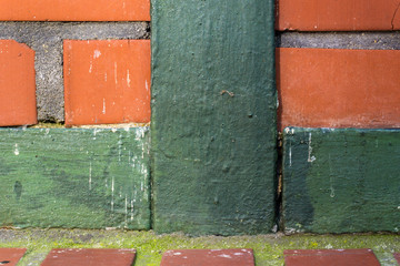 Metal details on brick wall