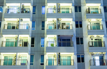 Apartment windows at night.