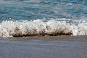 Breaking Atlantic ocean wave, Nazare, Portugal.