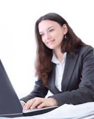 Portrait of business woman working with laptop
