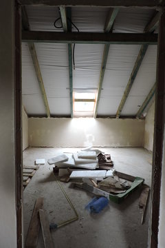 Some mess in an empty room under construction 