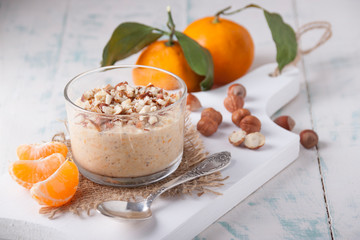 Smoothie of tangerine  and hazelnuts