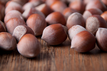 Hazelnuts  on a wooden background of old wood