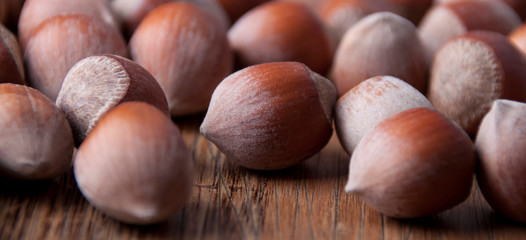 Hazelnuts  on a wooden background of old