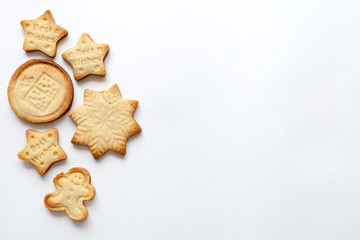 White christmas background with cookies, top view