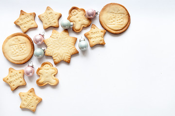 White christmas background with cookies, top view